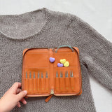 Lotus interchangeable needle case