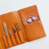 Lotus interchangeable needle case